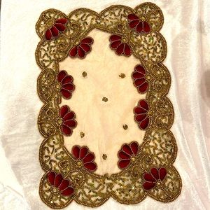 Beautiful table top mat in velvet burgundy's and bronze gold sequins .
